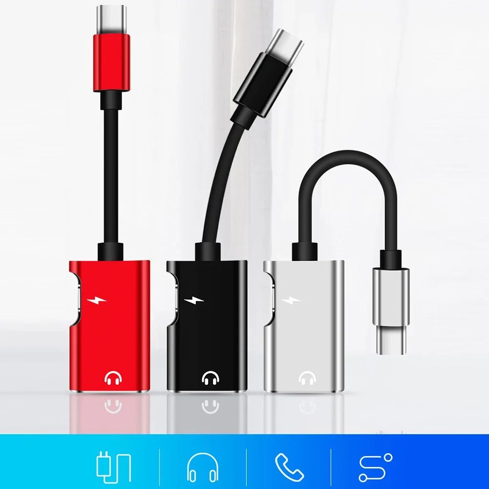 Adaptadores USB-C com cabo curto nas cores vermelho, preto e prata.